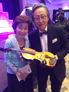 Mr. & Mrs Saionji of the Goi Peace Foundation bless the violin