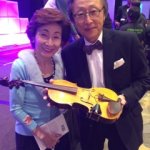Mr. & Mrs Saionji of the Goi Peace Foundation bless the violin